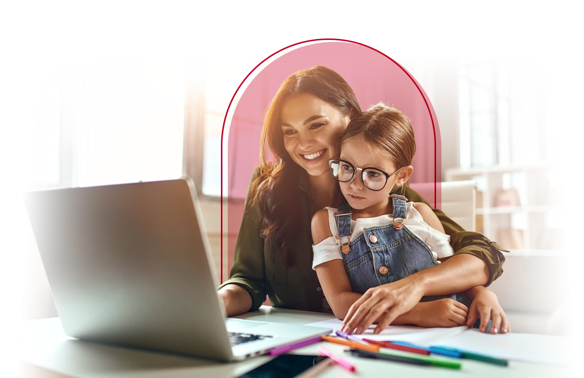 Women and daughter looking at laptop