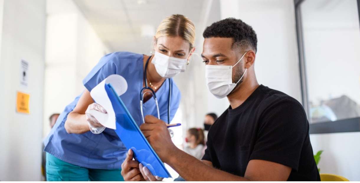 Man talking with nurse