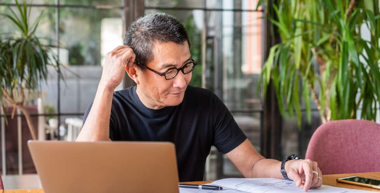 Man looking at computer.
