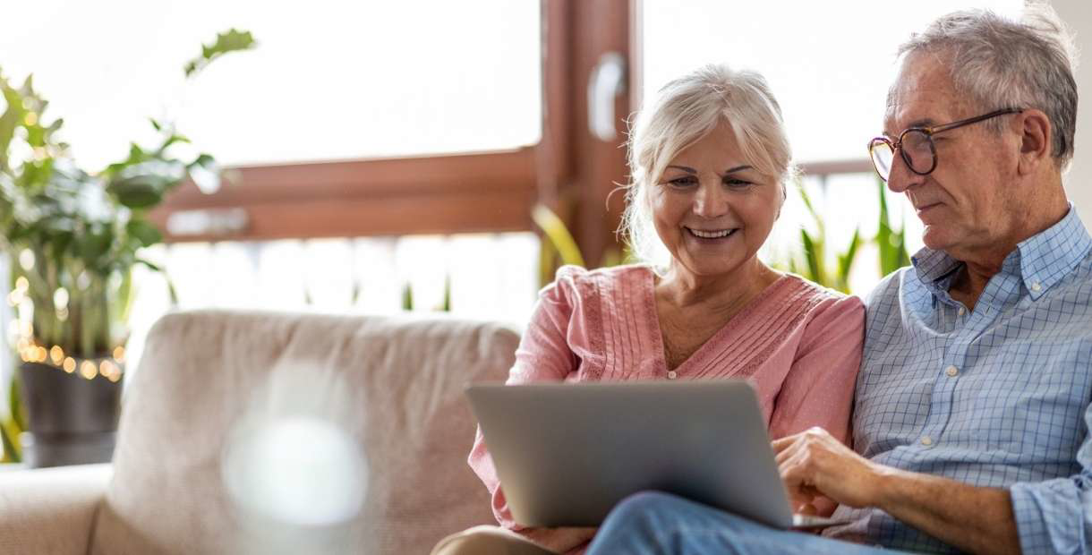Man and woman on computer.