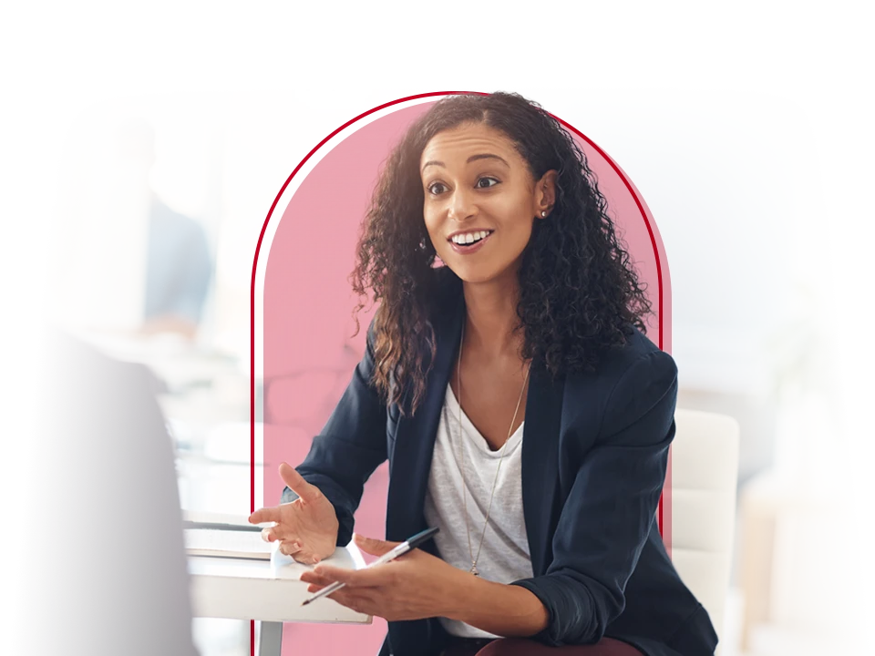 A female HR professional engaging in a discussion with a colleague.