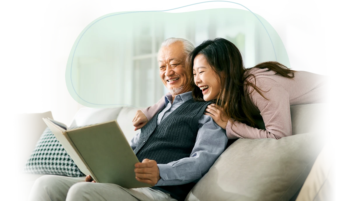 Father and adult daughter sharing memories