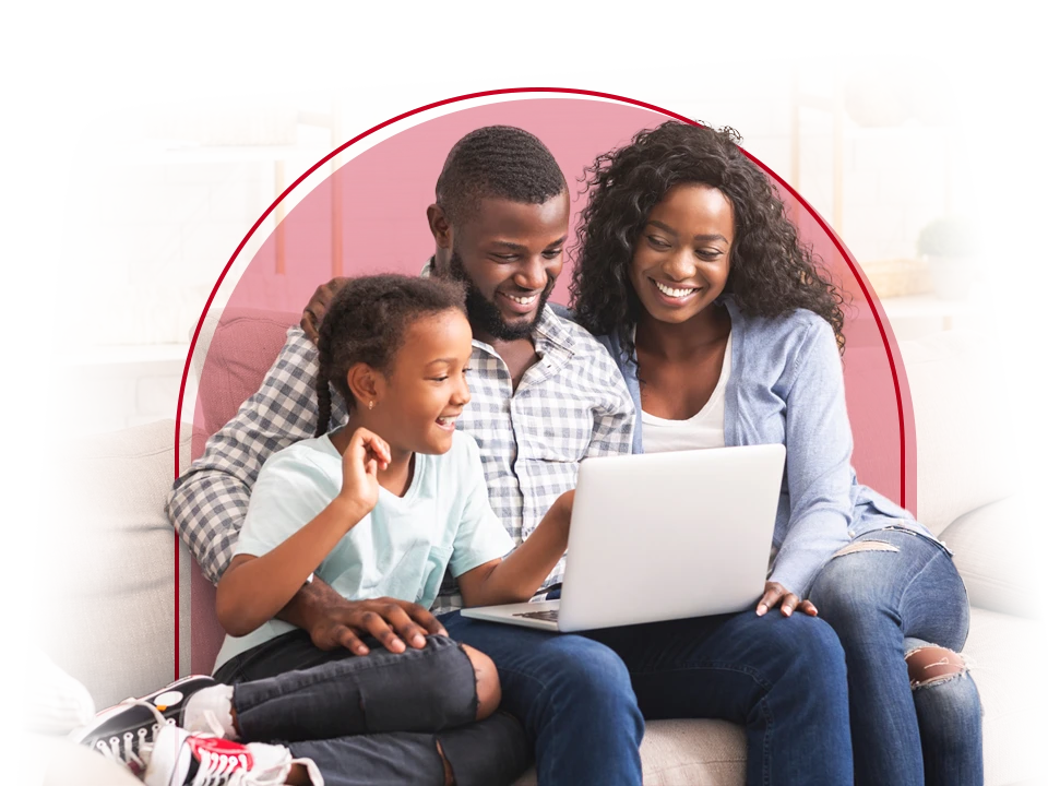 Family looking at a laptop.